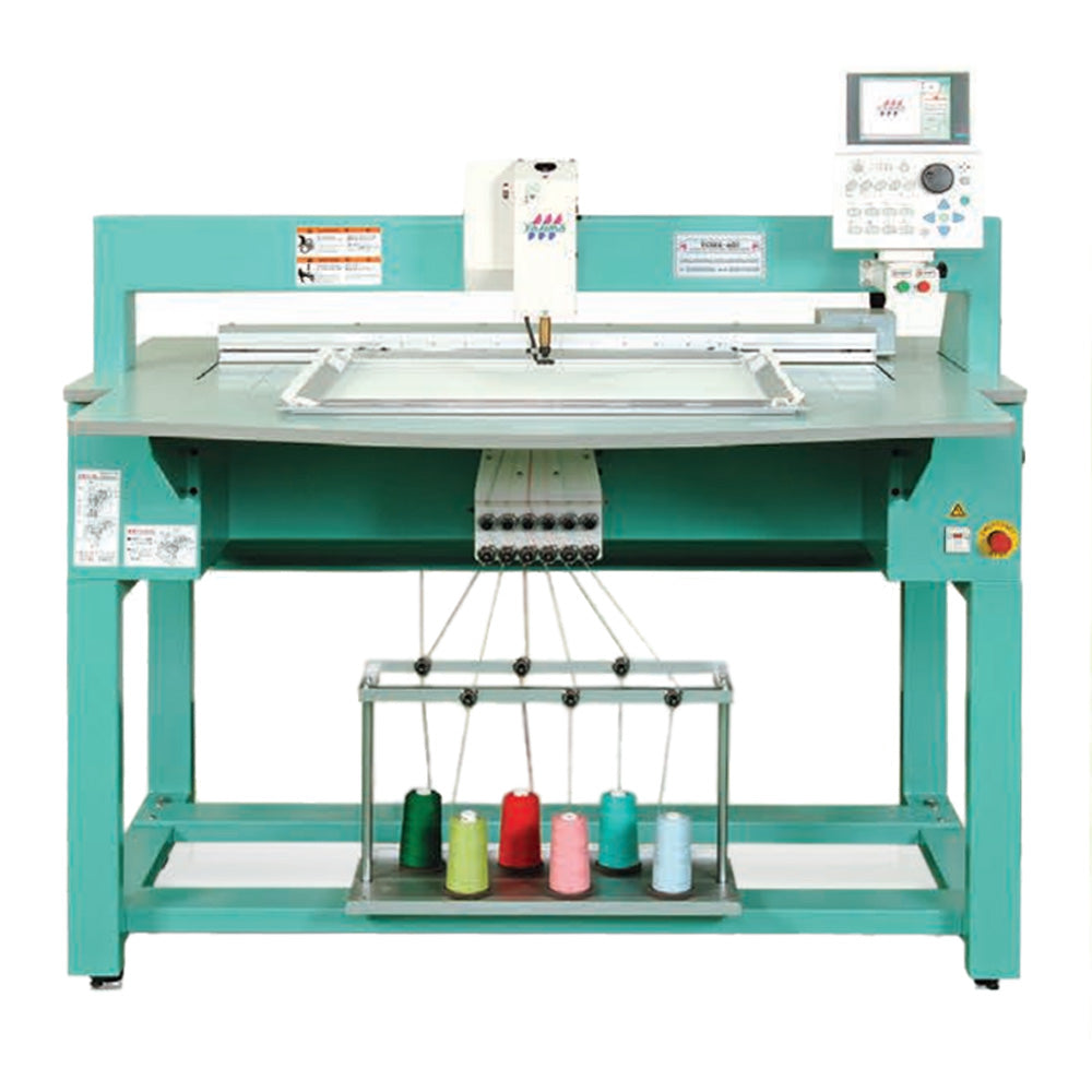 Tajima TCMX (Machine à broder les chenilles)